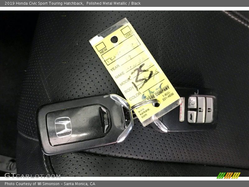 Polished Metal Metallic / Black 2019 Honda Civic Sport Touring Hatchback