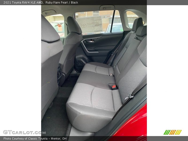 Ruby Flare Pearl / Black 2021 Toyota RAV4 XLE AWD