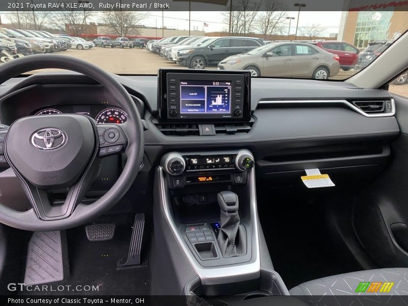 Ruby Flare Pearl / Black 2021 Toyota RAV4 XLE AWD