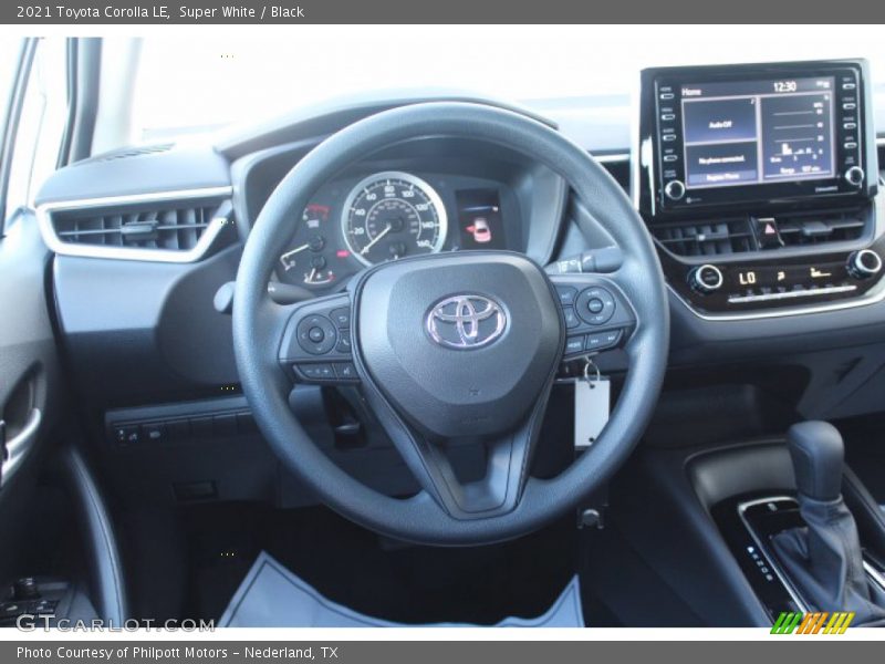 Super White / Black 2021 Toyota Corolla LE
