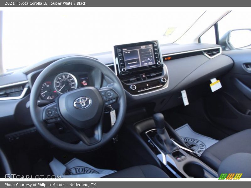 Super White / Black 2021 Toyota Corolla LE