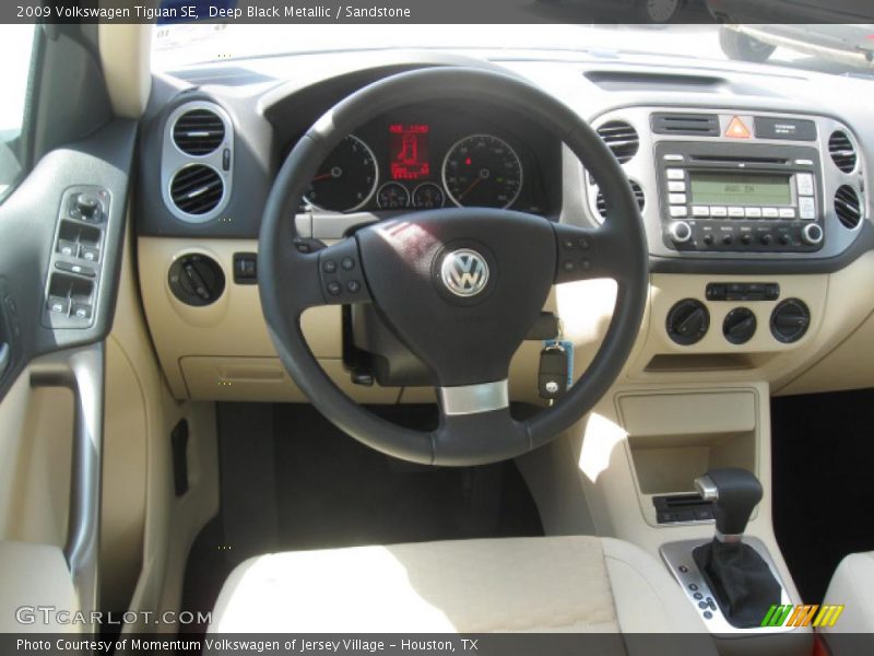 Deep Black Metallic / Sandstone 2009 Volkswagen Tiguan SE