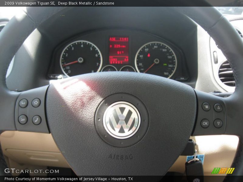 Deep Black Metallic / Sandstone 2009 Volkswagen Tiguan SE
