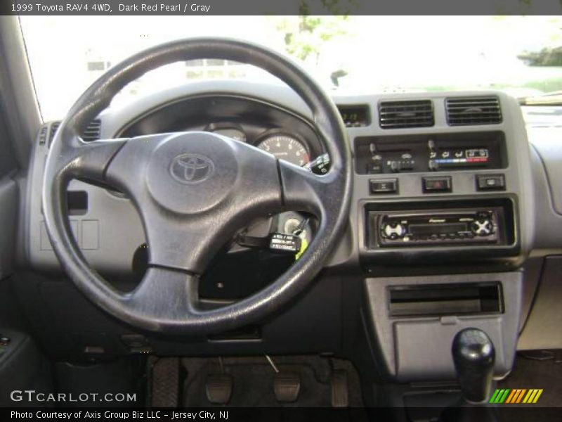 Dark Red Pearl / Gray 1999 Toyota RAV4 4WD