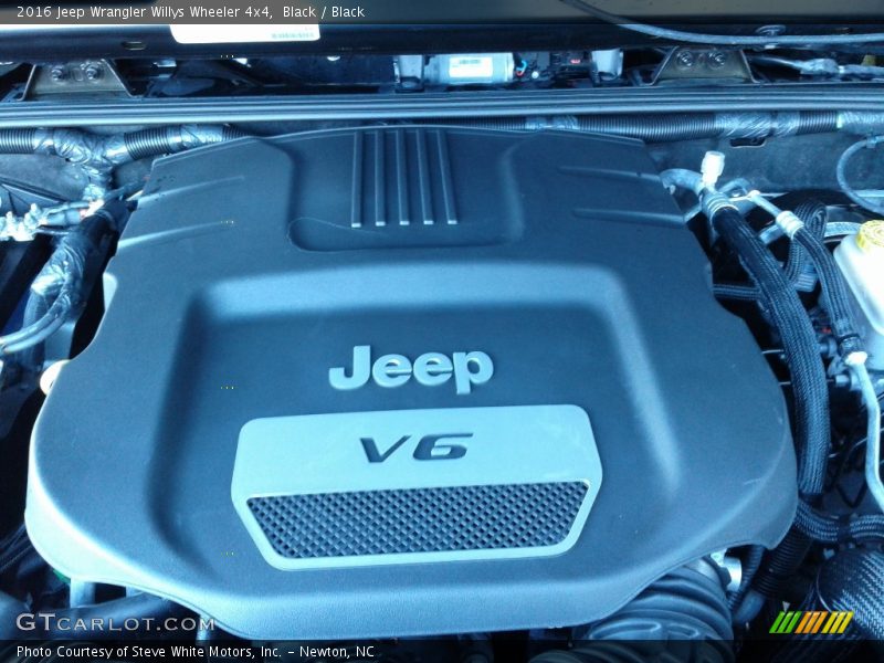 Black / Black 2016 Jeep Wrangler Willys Wheeler 4x4