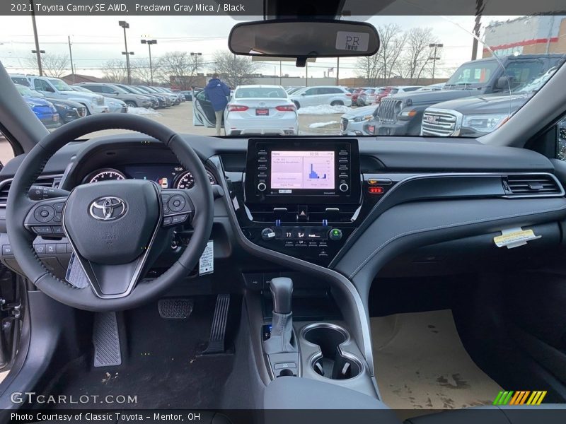 Dashboard of 2021 Camry SE AWD