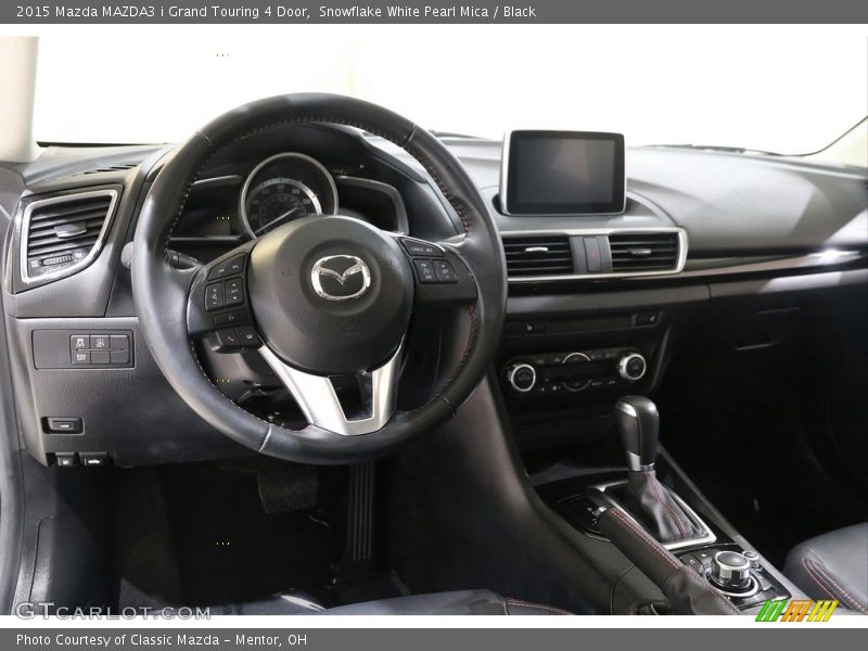 Dashboard of 2015 MAZDA3 i Grand Touring 4 Door