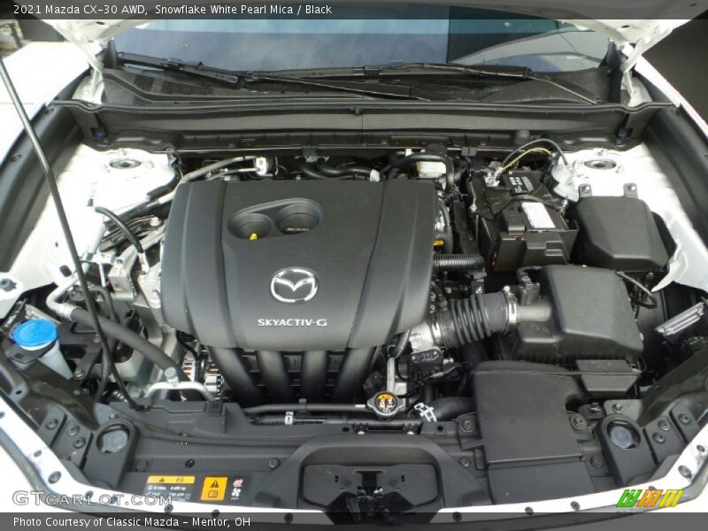 Snowflake White Pearl Mica / Black 2021 Mazda CX-30 AWD