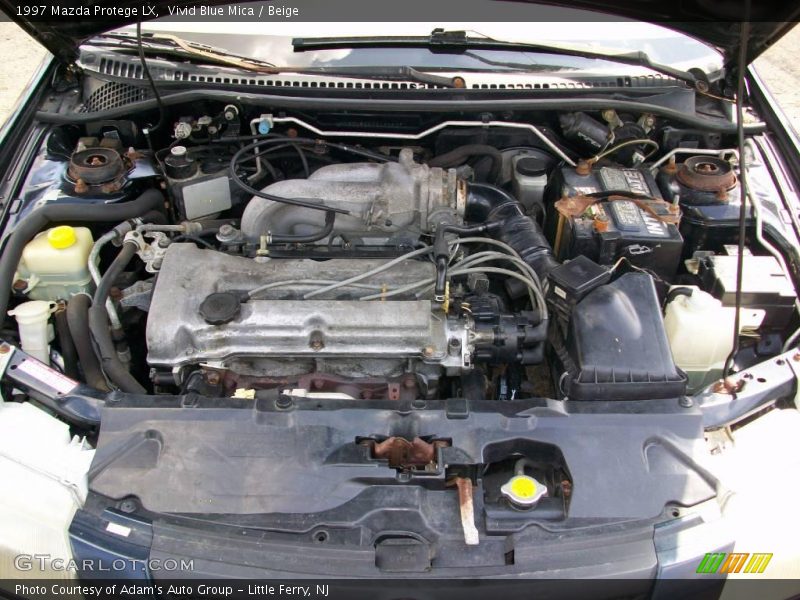 Vivid Blue Mica / Beige 1997 Mazda Protege LX