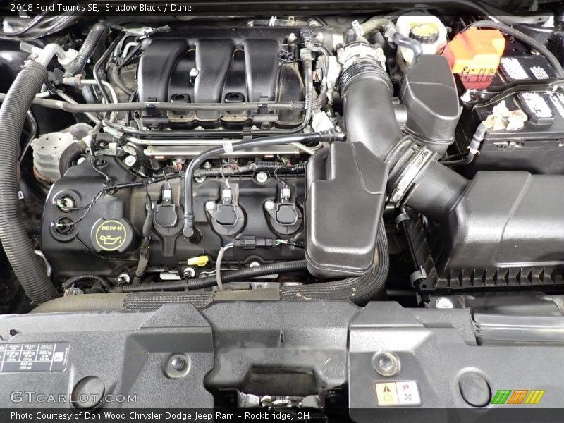 Shadow Black / Dune 2018 Ford Taurus SE