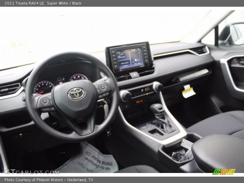 Super White / Black 2021 Toyota RAV4 LE