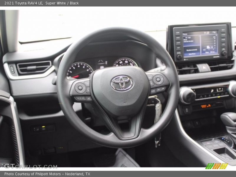 Super White / Black 2021 Toyota RAV4 LE