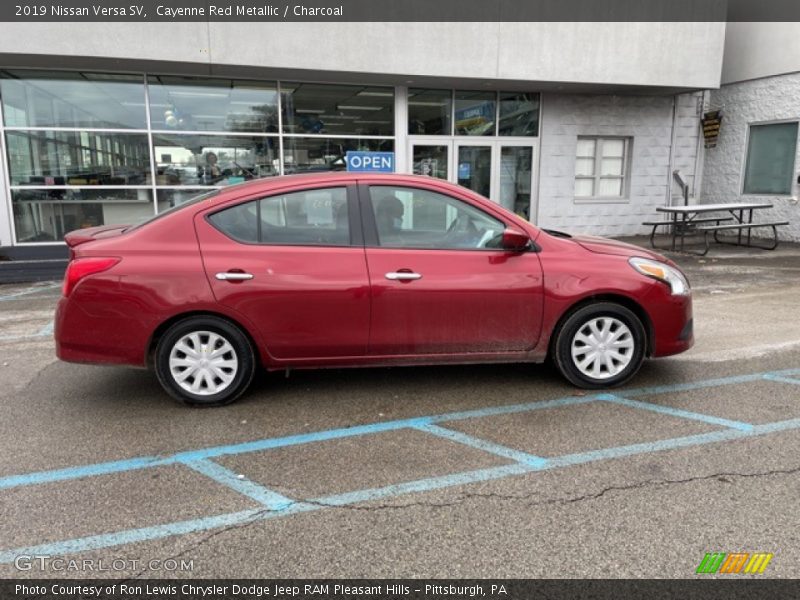Cayenne Red Metallic / Charcoal 2019 Nissan Versa SV