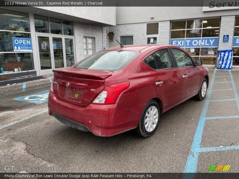 Cayenne Red Metallic / Charcoal 2019 Nissan Versa SV