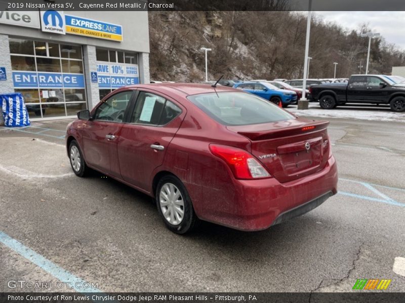 Cayenne Red Metallic / Charcoal 2019 Nissan Versa SV