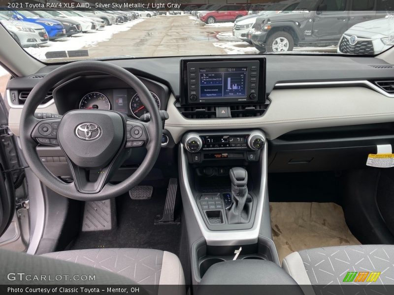 Silver Sky Metallic / Light Gray 2021 Toyota RAV4 XLE AWD