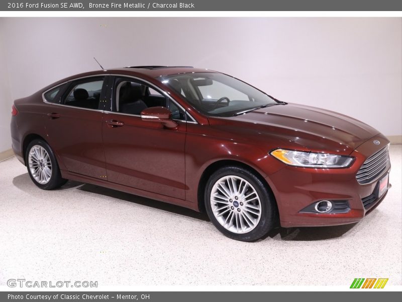 Bronze Fire Metallic / Charcoal Black 2016 Ford Fusion SE AWD