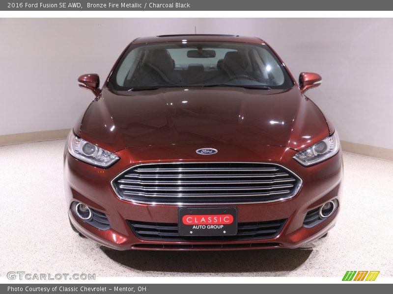 Bronze Fire Metallic / Charcoal Black 2016 Ford Fusion SE AWD