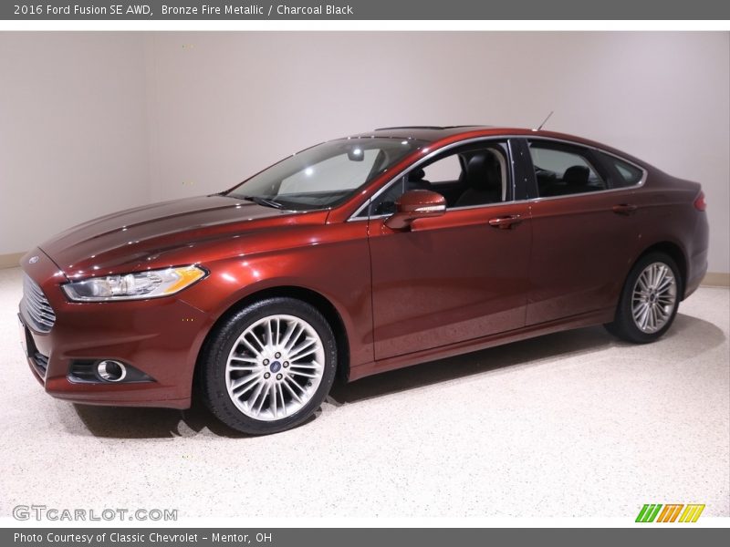 Bronze Fire Metallic / Charcoal Black 2016 Ford Fusion SE AWD