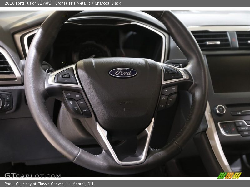 Bronze Fire Metallic / Charcoal Black 2016 Ford Fusion SE AWD
