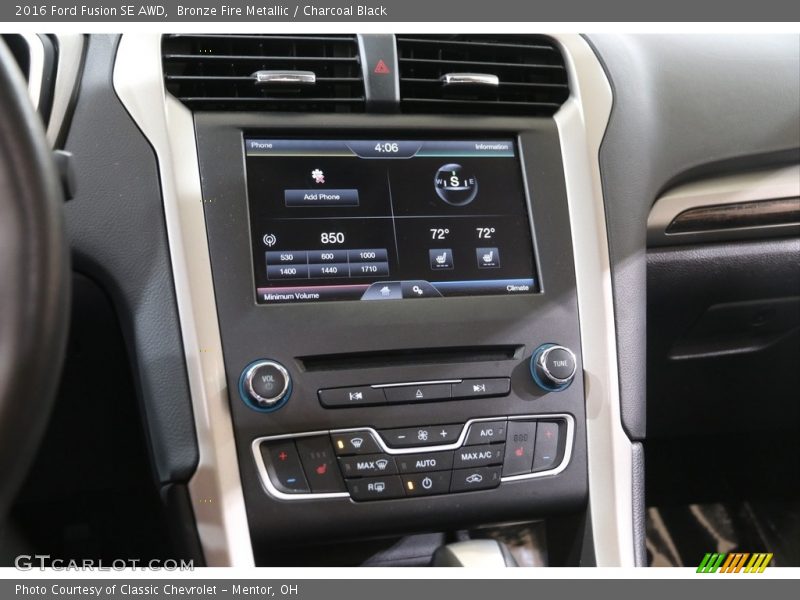 Bronze Fire Metallic / Charcoal Black 2016 Ford Fusion SE AWD