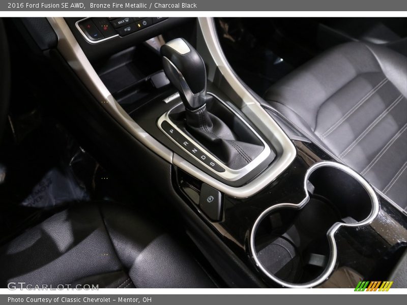 Bronze Fire Metallic / Charcoal Black 2016 Ford Fusion SE AWD