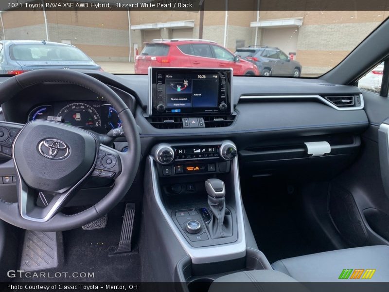 Blizzard White Pearl / Black 2021 Toyota RAV4 XSE AWD Hybrid