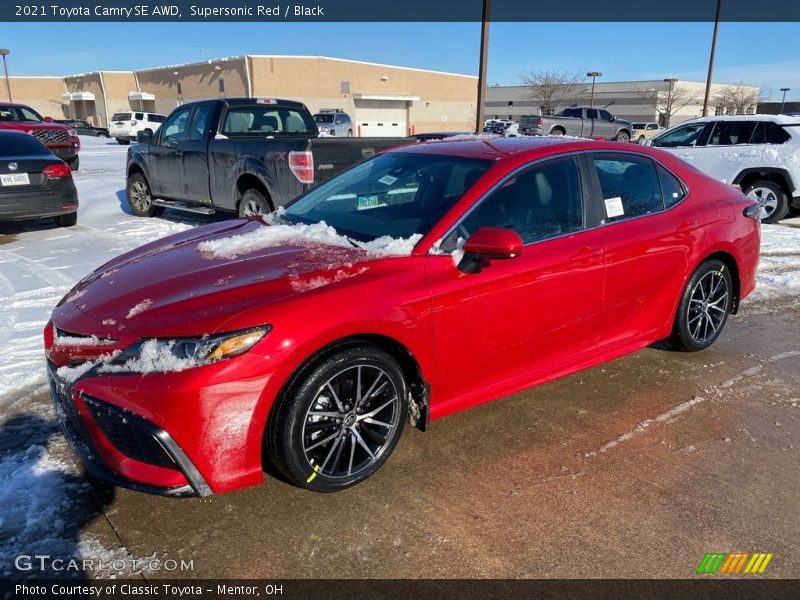 Supersonic Red / Black 2021 Toyota Camry SE AWD