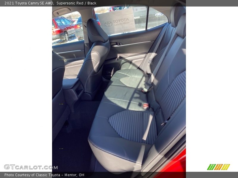 Supersonic Red / Black 2021 Toyota Camry SE AWD