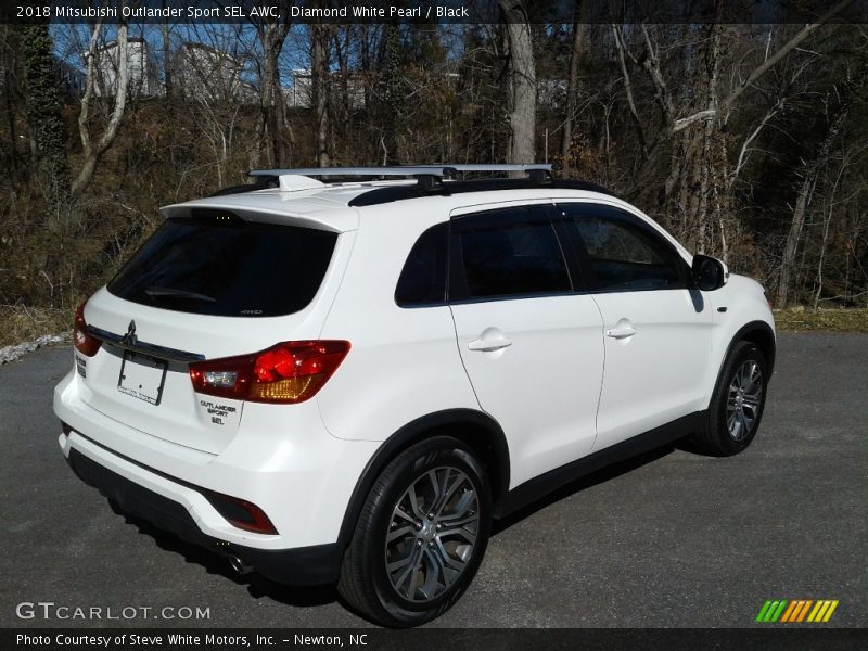 Diamond White Pearl / Black 2018 Mitsubishi Outlander Sport SEL AWC
