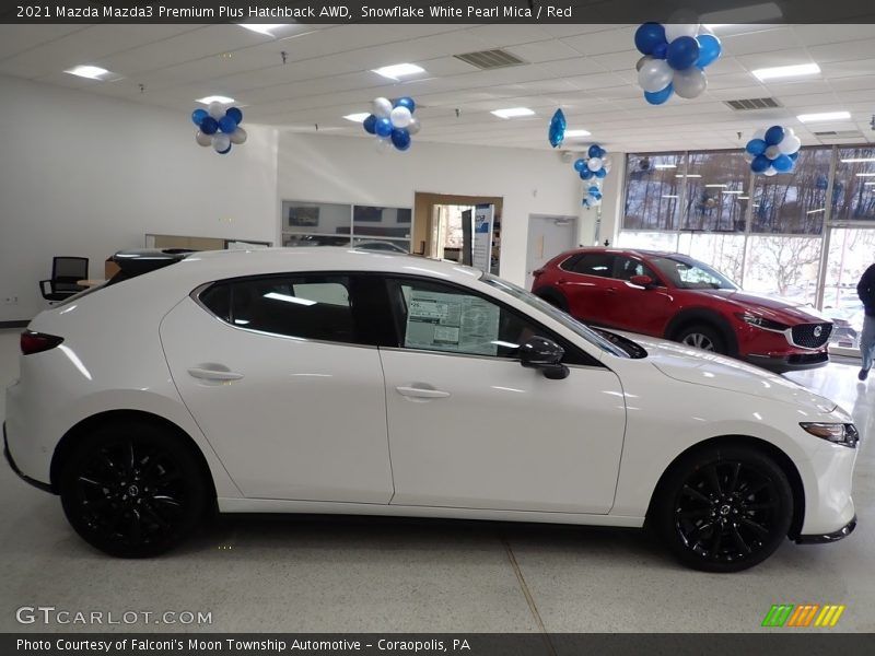 Snowflake White Pearl Mica / Red 2021 Mazda Mazda3 Premium Plus Hatchback AWD