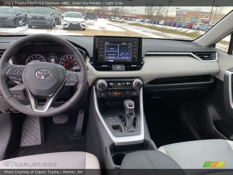 Silver Sky Metallic / Light Gray 2021 Toyota RAV4 XLE Premium AWD