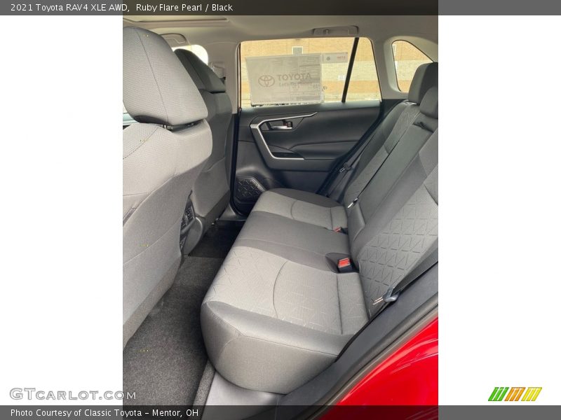 Ruby Flare Pearl / Black 2021 Toyota RAV4 XLE AWD