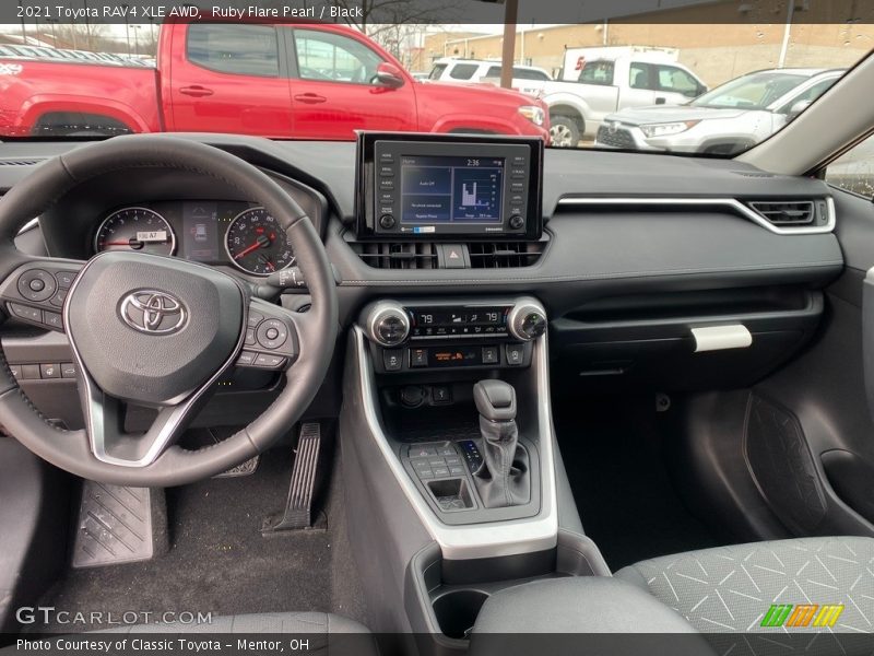 Ruby Flare Pearl / Black 2021 Toyota RAV4 XLE AWD