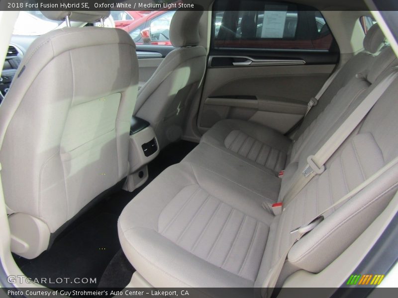 Oxford White / Medium Light Stone 2018 Ford Fusion Hybrid SE