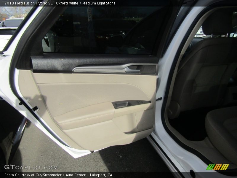Oxford White / Medium Light Stone 2018 Ford Fusion Hybrid SE