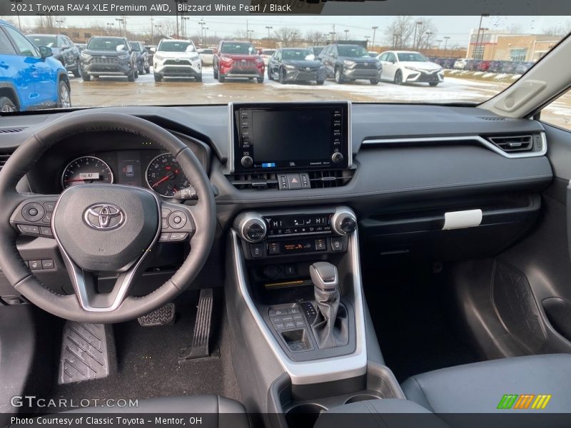 Blizzard White Pearl / Black 2021 Toyota RAV4 XLE Premium AWD