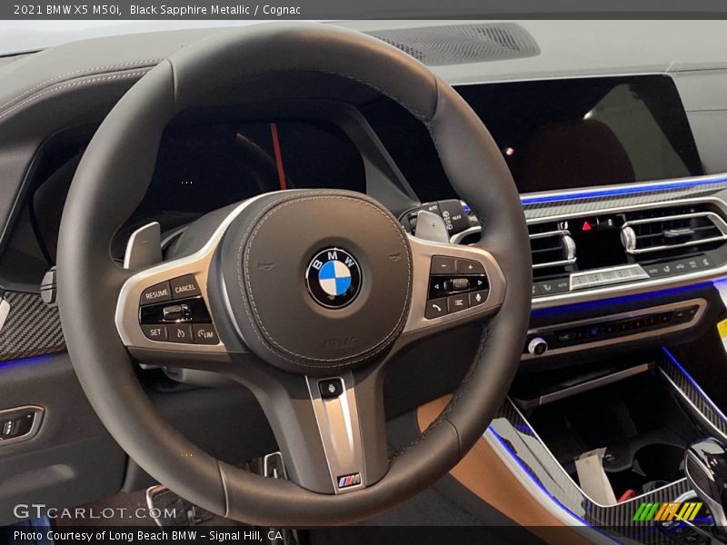 Black Sapphire Metallic / Cognac 2021 BMW X5 M50i