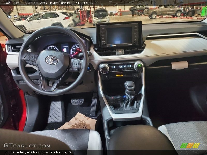 Ruby Flare Pearl / Light Gray 2021 Toyota RAV4 XLE AWD