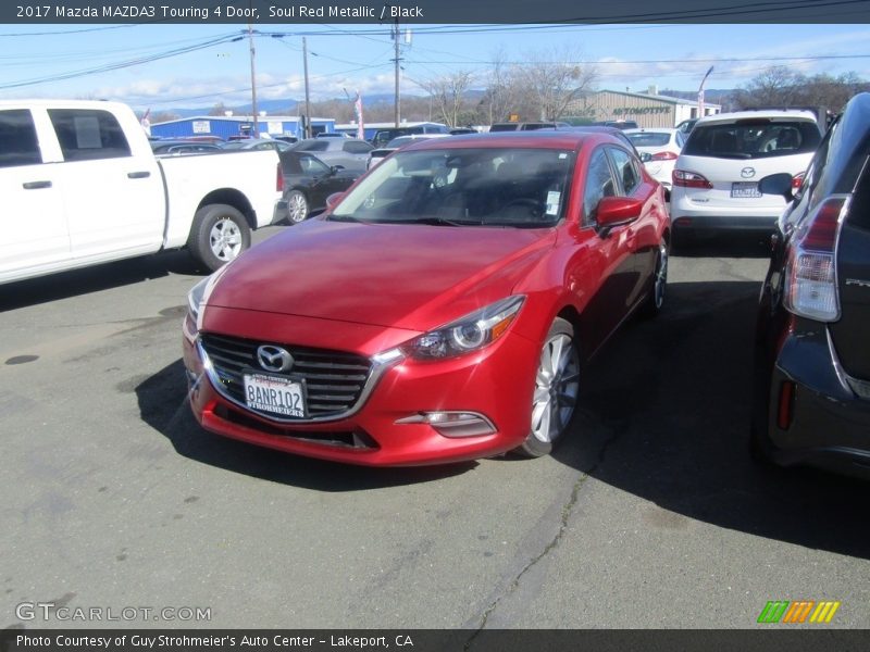 Soul Red Metallic / Black 2017 Mazda MAZDA3 Touring 4 Door