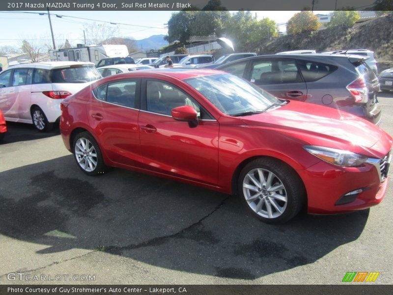 Soul Red Metallic / Black 2017 Mazda MAZDA3 Touring 4 Door