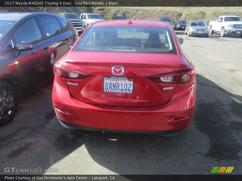 Soul Red Metallic / Black 2017 Mazda MAZDA3 Touring 4 Door