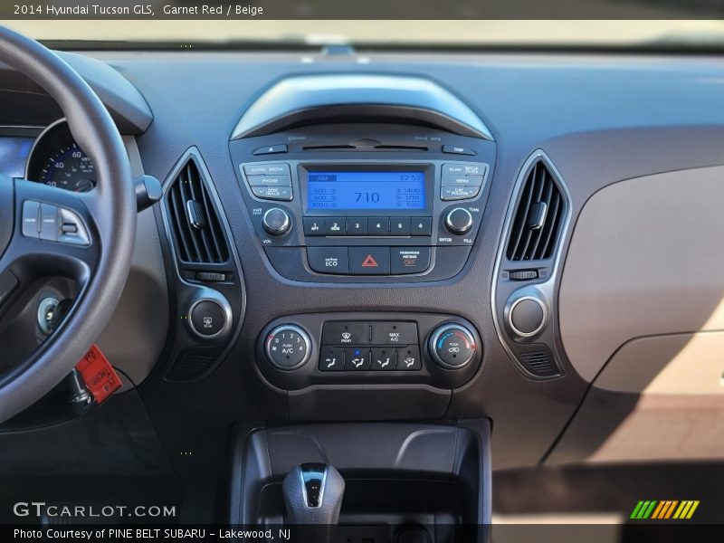 Garnet Red / Beige 2014 Hyundai Tucson GLS