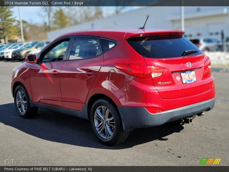 Garnet Red / Beige 2014 Hyundai Tucson GLS