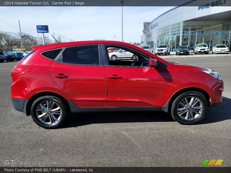 Garnet Red / Beige 2014 Hyundai Tucson GLS