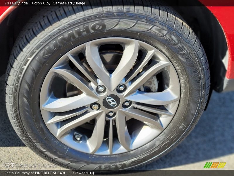 Garnet Red / Beige 2014 Hyundai Tucson GLS