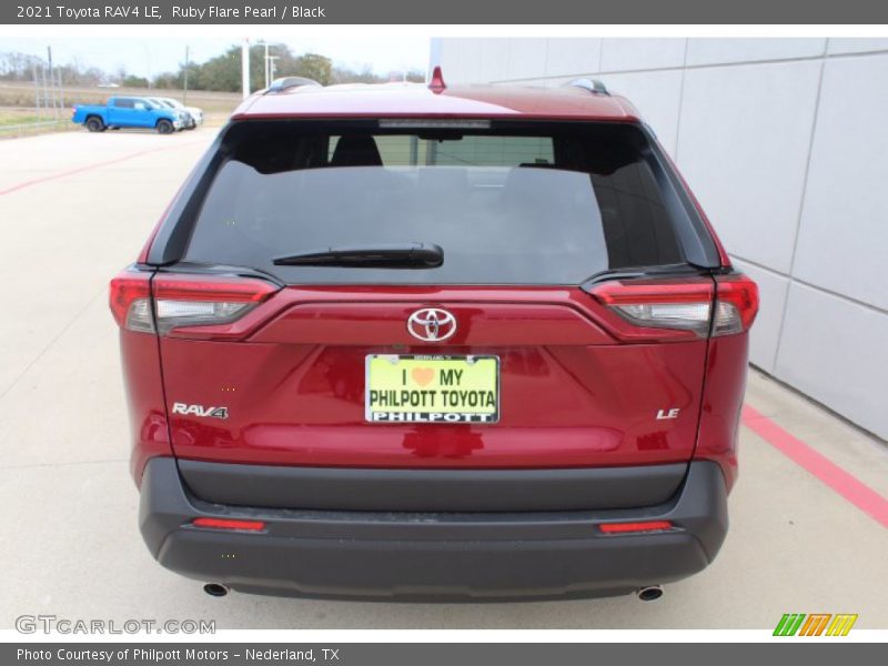 Ruby Flare Pearl / Black 2021 Toyota RAV4 LE