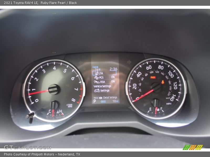 Ruby Flare Pearl / Black 2021 Toyota RAV4 LE