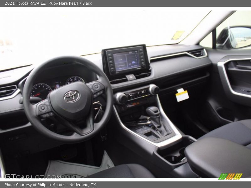 Ruby Flare Pearl / Black 2021 Toyota RAV4 LE