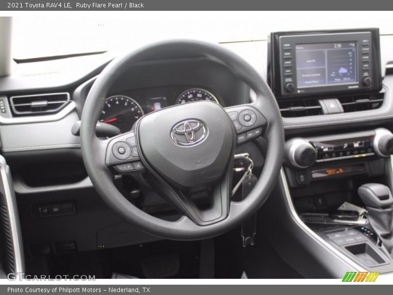 Ruby Flare Pearl / Black 2021 Toyota RAV4 LE